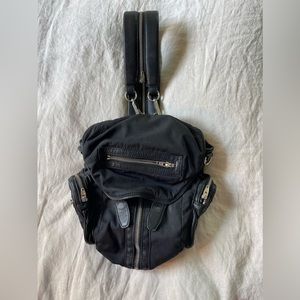 Alexander Wang “Marti” black leather and fabric backpack, shoulder bag.